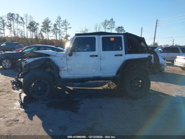 1C4BJWEG4EL122347 Jeep Wrangler Unlimited Sahara