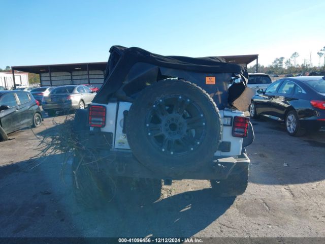 1C4BJWEG4EL122347 Jeep Wrangler Unlimited Sahara