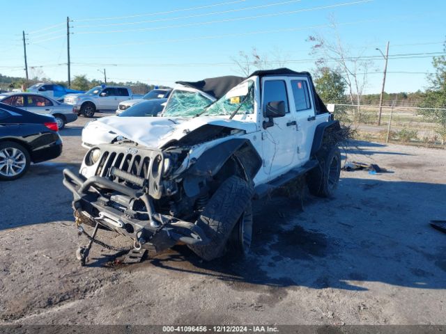 1C4BJWEG4EL122347 Jeep Wrangler Unlimited Sahara