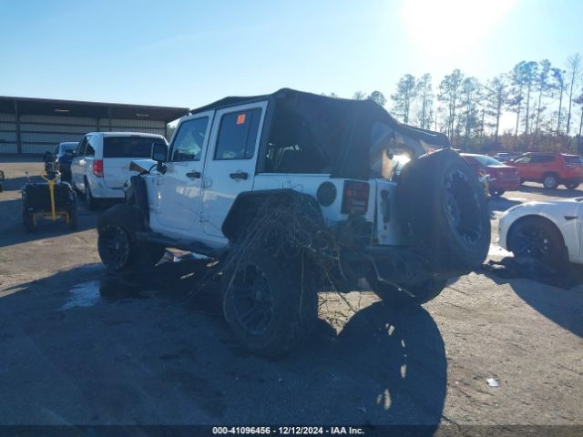 1C4BJWEG4EL122347 Jeep Wrangler Unlimited Sahara
