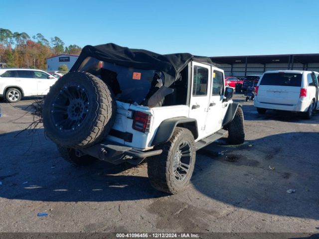 1C4BJWEG4EL122347 Jeep Wrangler Unlimited Sahara