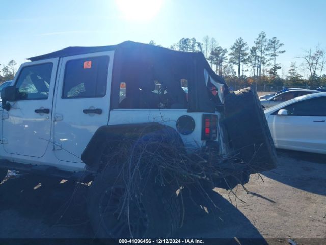 1C4BJWEG4EL122347 Jeep Wrangler Unlimited Sahara