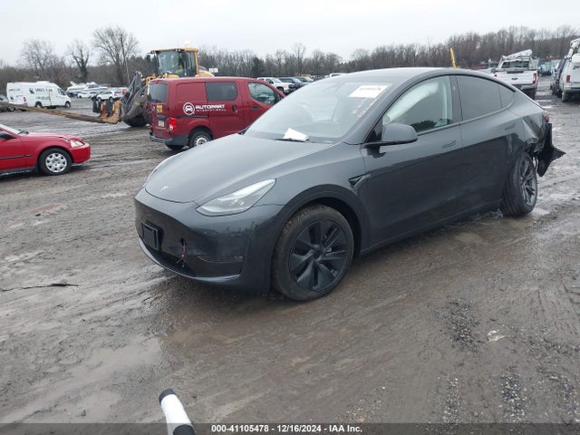 2024 TESLA MODEL Y 7SAYGDEE6RA329410 Photo 1