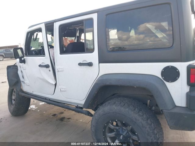 1C4BJWDG6EL130452 Jeep Wrangler Unlimited Sport