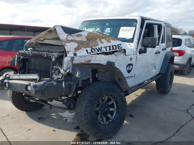 1C4BJWDG6EL130452 Jeep Wrangler Unlimited Sport