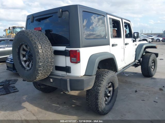 1C4BJWDG6EL130452 Jeep Wrangler Unlimited Sport