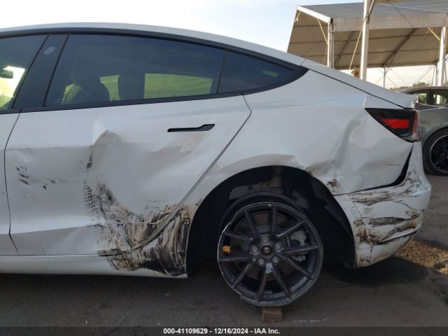 5YJ3E1EA5MF858898 Tesla Model 3 Standard Range Plus Rear-wheel Drive