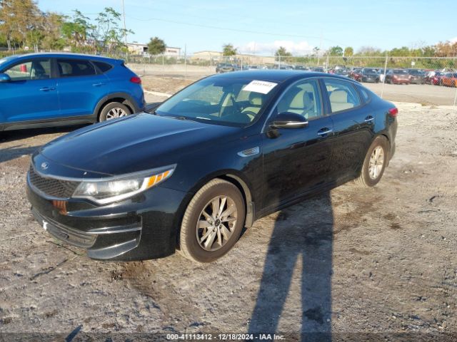 5XXGT4L34GG117107 KIA Optima Lx