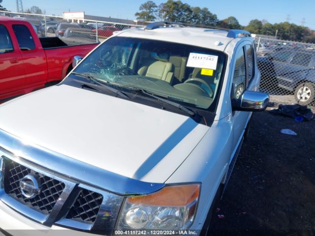 5N1BA0ND2EN613793 Nissan Armada Sl