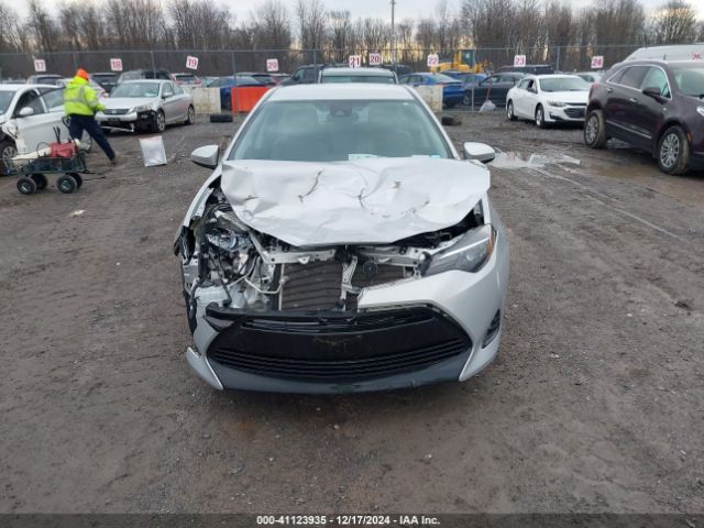 2T1BURHE7KC212629 Toyota COROLLA LE