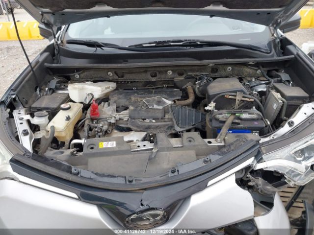 JTMZFREV6JJ175170 Toyota RAV4 LE