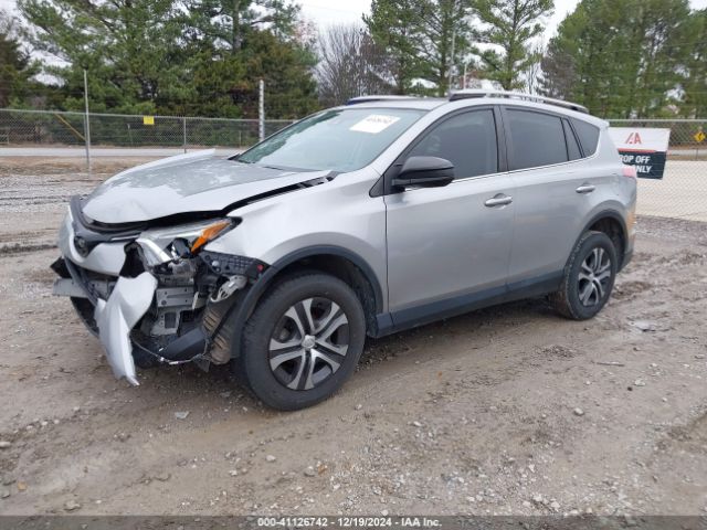 JTMZFREV6JJ175170 Toyota RAV4 LE