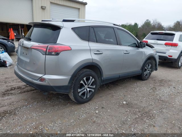 JTMZFREV6JJ175170 Toyota RAV4 LE