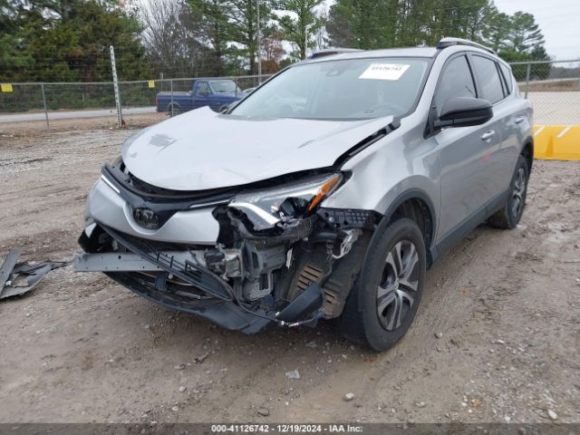JTMZFREV6JJ175170 Toyota RAV4 LE