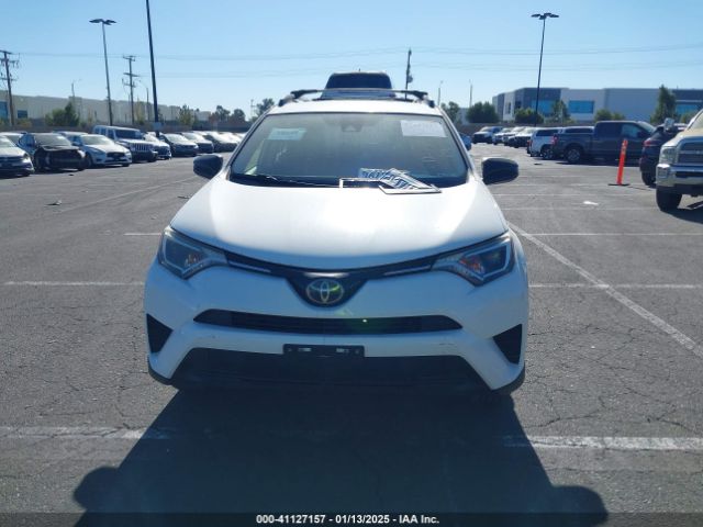 JTMZFREVXJJ196751 Toyota RAV4 LE