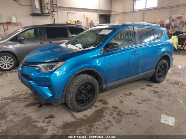 2T3BFREV8GW411233 Toyota RAV4 LE