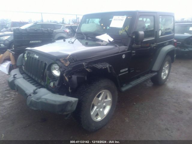 1C4AJWAGXGL103130 Jeep Wrangler Sport