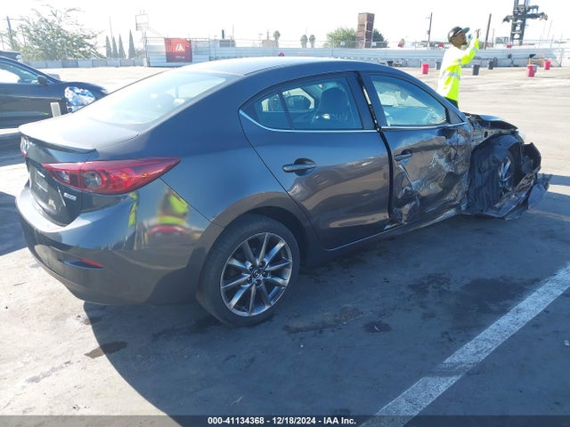 3MZBN1V39JM211454 Mazda Mazda3 Touring