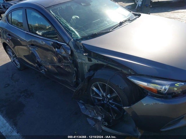 3MZBN1V39JM211454 Mazda Mazda3 Touring