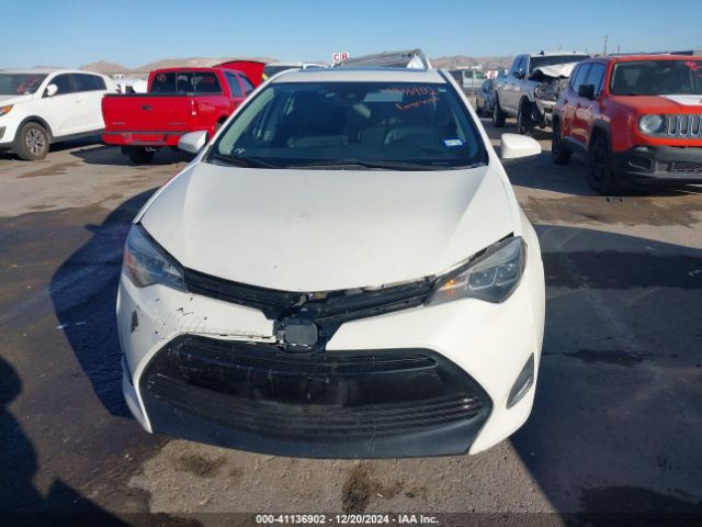 5YFBURHE6KP857899 Toyota Corolla Xle