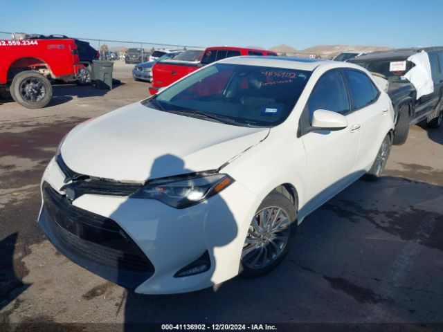 5YFBURHE6KP857899 Toyota Corolla Xle