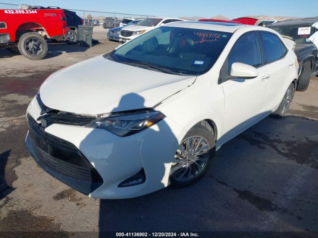 5YFBURHE6KP857899 Toyota Corolla Xle