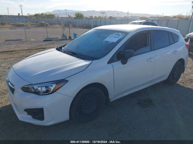 4S3GTAA63K3704032 Subaru Impreza 2.0i