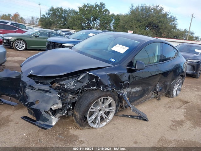 2024 TESLA MODEL Y 7SAYGDED4RF042898 Photo 1