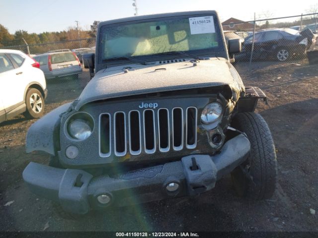 1C4AJWBG6GL128492 Jeep Wrangler Sahara