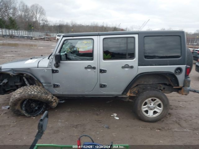 1C4HJWDG0FL577094 Jeep Wrangler Unlimited Sport