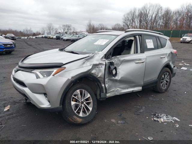2016 TOYOTA RAV4 HYBRID JTMRJREV1GD014313 Photo 1