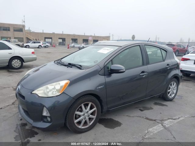 JTDKDTB31E1067004 Toyota Prius C Four