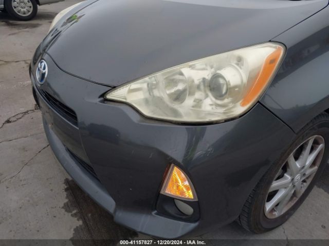 JTDKDTB31E1067004 Toyota Prius C Four