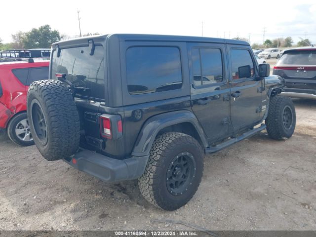 1C4HJXEN4LW127736 Jeep Wrangler Unlimited Sahara 4x4
