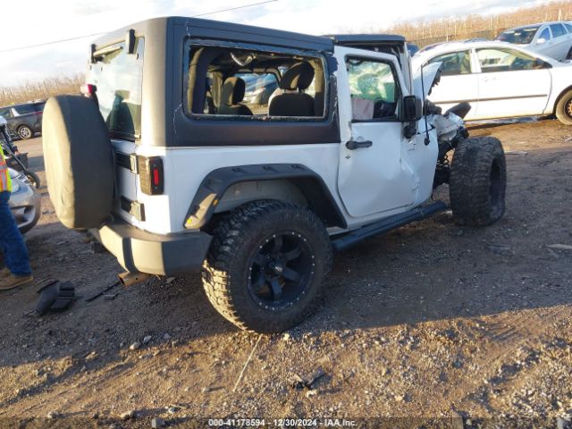 1C4AJWAG0FL516351 Jeep Wrangler Sport