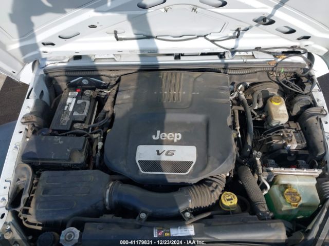 1C4HJWDG7EL263439 Jeep Wrangler Unlimited Sport