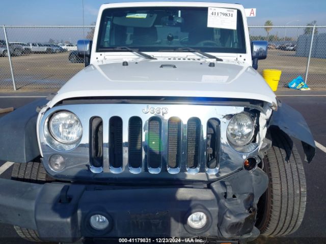1C4HJWDG7EL263439 Jeep Wrangler Unlimited Sport