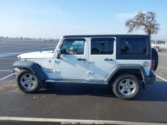 1C4HJWDG7EL263439 Jeep Wrangler Unlimited Sport