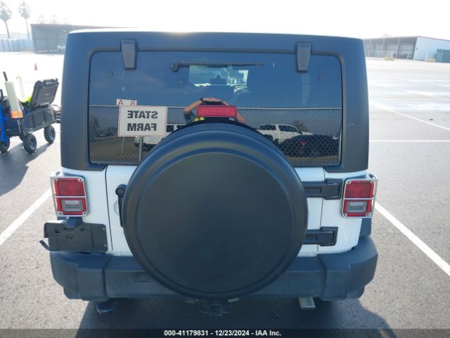 1C4HJWDG7EL263439 Jeep Wrangler Unlimited Sport