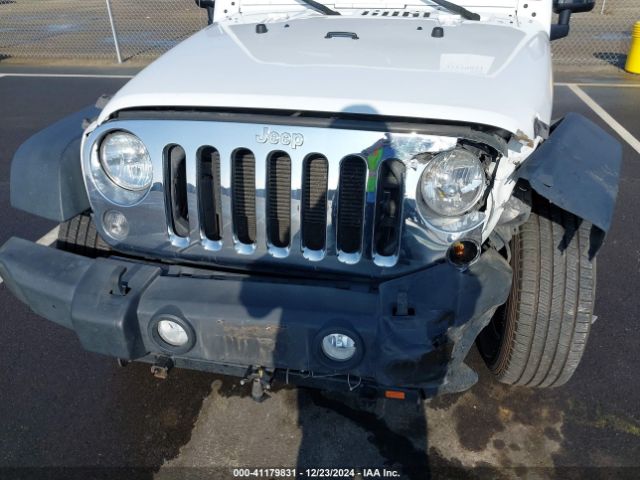 1C4HJWDG7EL263439 Jeep Wrangler Unlimited Sport
