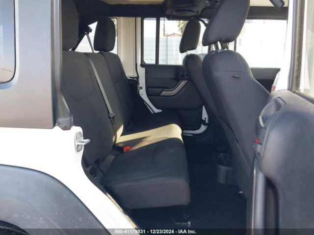 1C4HJWDG7EL263439 Jeep Wrangler Unlimited Sport