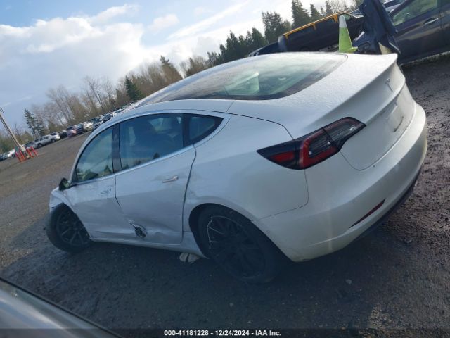 5YJ3E1EA4JF051011 Tesla Model 3 Long Range/mid Range