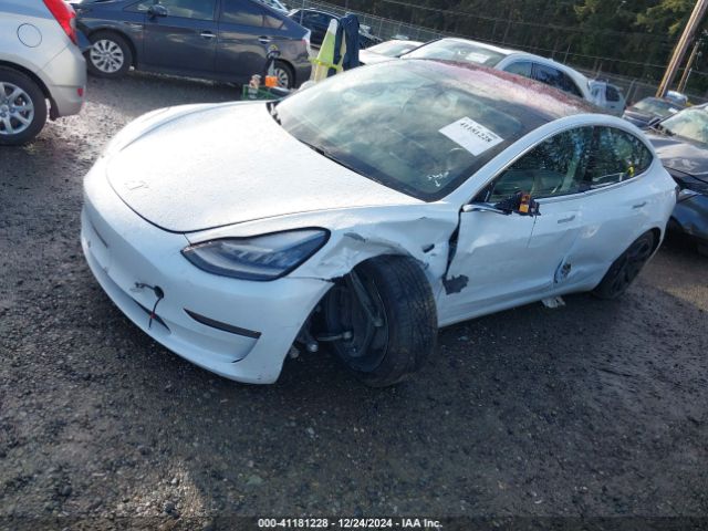 5YJ3E1EA4JF051011 Tesla Model 3 Long Range/mid Range