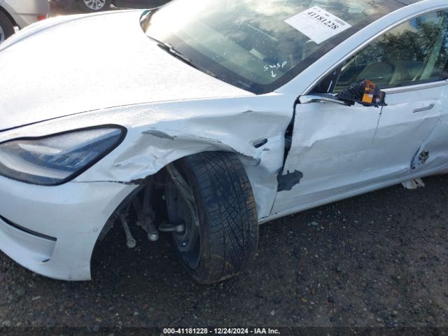 5YJ3E1EA4JF051011 Tesla Model 3 Long Range/mid Range