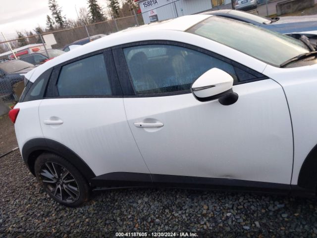 JM1DKFC75H0170647 Mazda Cx-3 Touring
