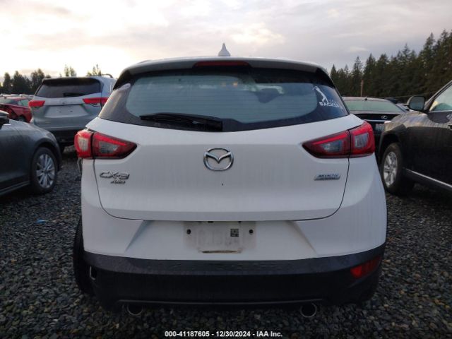 JM1DKFC75H0170647 Mazda Cx-3 Touring