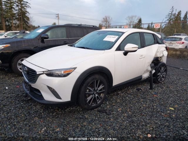 JM1DKFC75H0170647 Mazda Cx-3 Touring