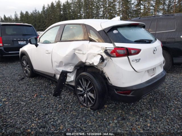 JM1DKFC75H0170647 Mazda Cx-3 Touring