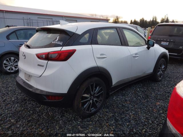 JM1DKFC75H0170647 Mazda Cx-3 Touring