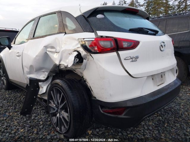JM1DKFC75H0170647 Mazda Cx-3 Touring